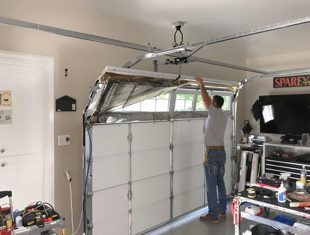 Garage door section replacement by Mahoning Garage Door Repair in Mahoning