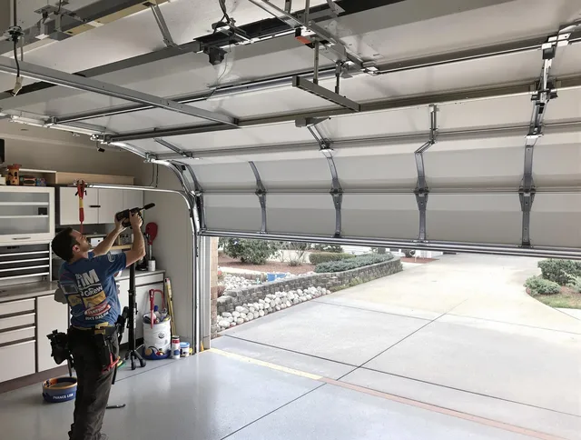 Garage door track repair service by Mahoning Garage Door Repair in Mahoning